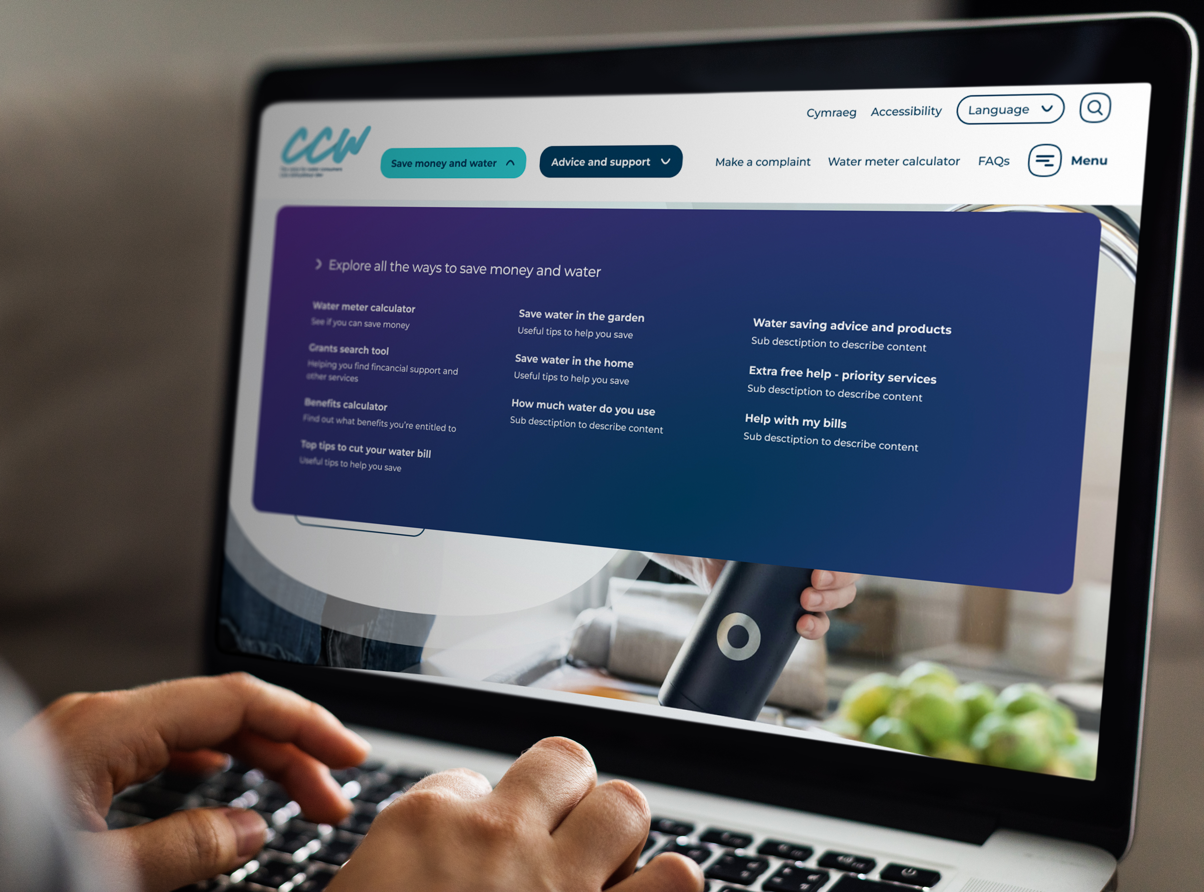 Laptop with the CCW homepage on screen with the dropdown mega menu expanded