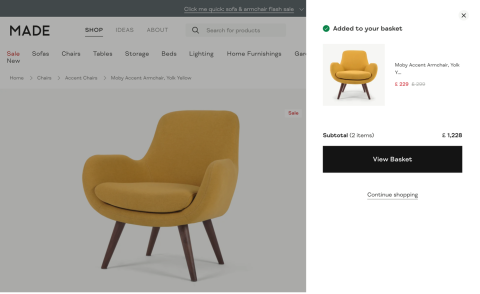 Online furniture store showing a yellow armchair added to the basket, followed by the shopping basket and checkout details
