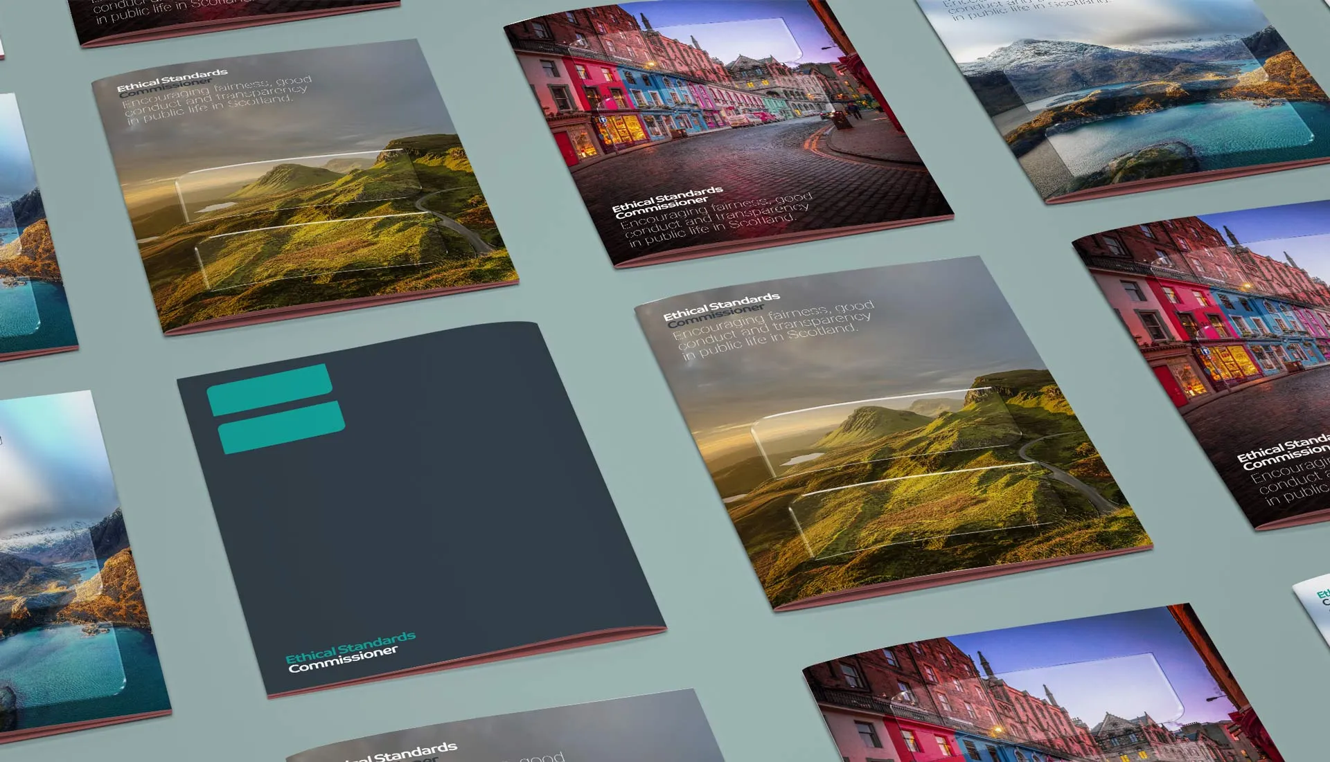Multiple brochure cover mockups on a flat table